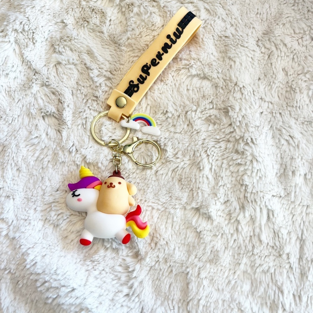 Sanrio Poppompurin on a Unicorn Keychain Wristlet Bag Charm